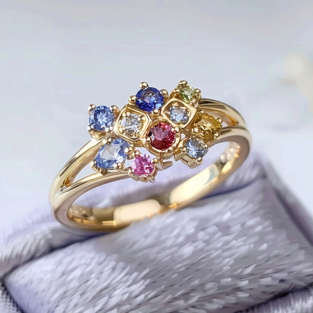 Gold ring with colorful crystals