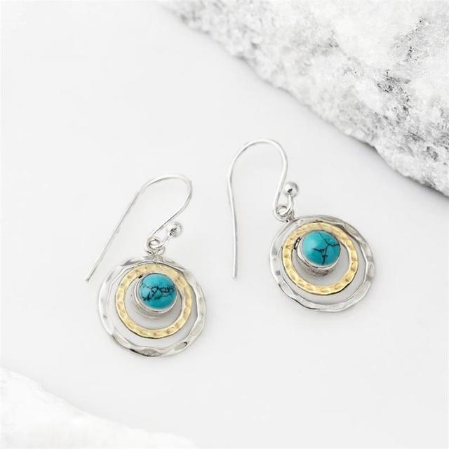 Boho Saturn earrings with turquoise stone in silver and gold