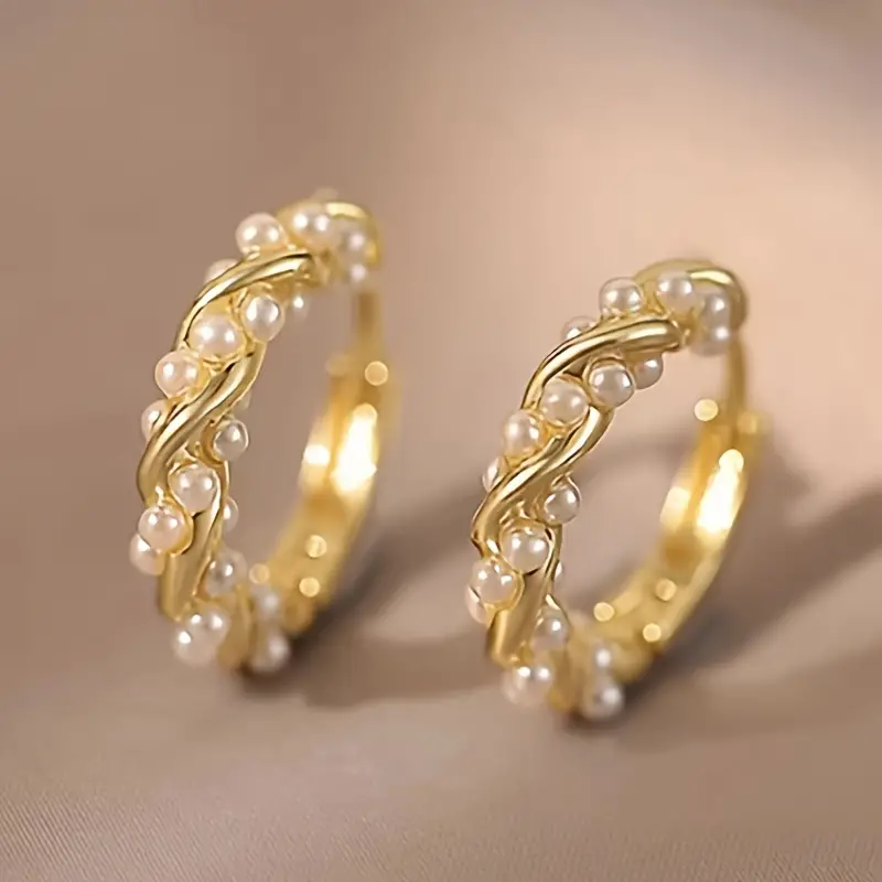 Gold-plated knotted earrings with pearls